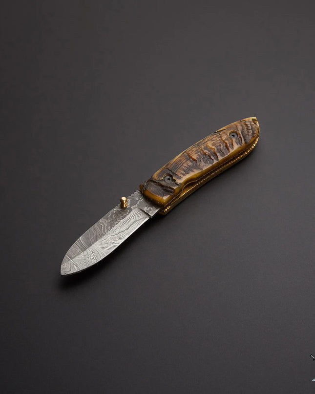 Damascus Folding Knife with Sheep Horn Handle and Premium Leather Sheath
